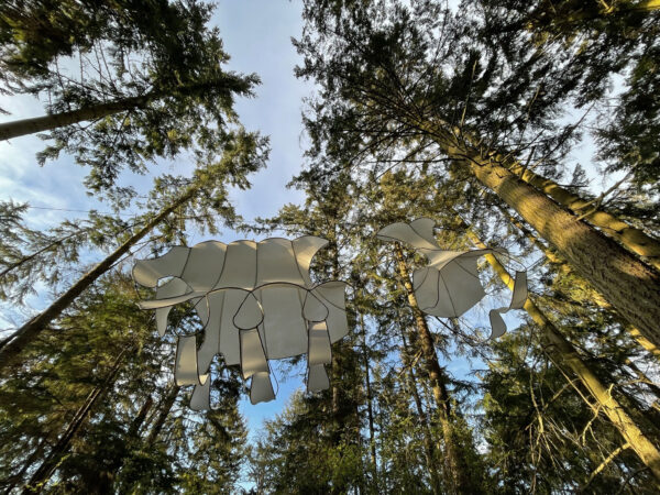 Vertebrae by Sarah Fetterman looking up from path at Price Sculpture Forest