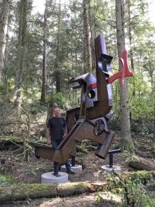 Sculptor MacRae Wylde with Stevo's Dream The Ultimate Flying Machine at Price Sculpture Forest