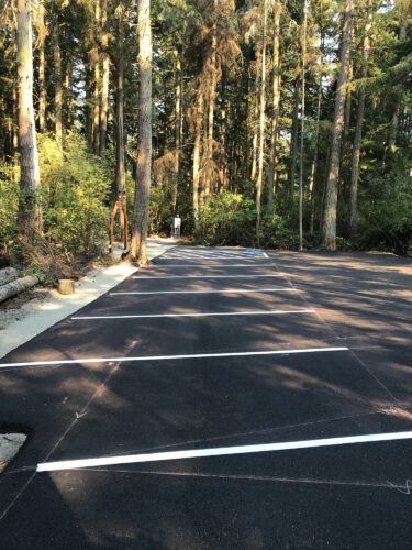 Parking lot striping at Price Sculpture Forest sculpture park in Coupeville on Whidbey Island