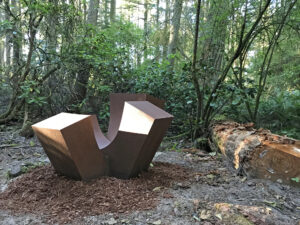 Sculptor Jan Hoy 4-Up at Price Sculpture Forest sculpture park Coupeville Whidbey Island