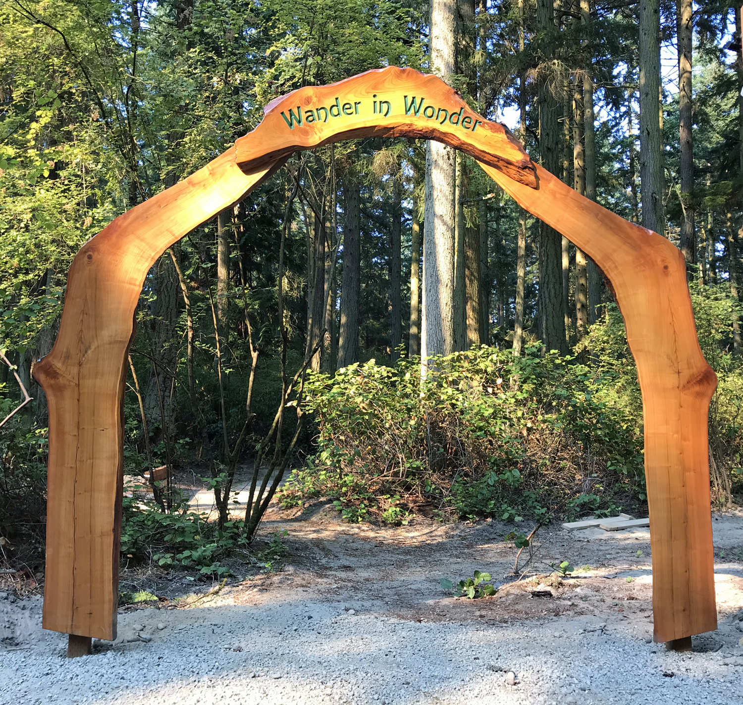Wander In Wonder entrance arch at Price Sculpture Forest sculpture park Coupeville Whidbey Island