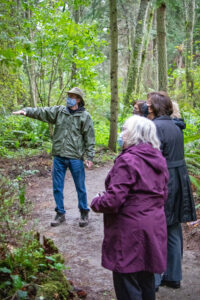 Scott leading tour with officials in Price Sculpture Forest