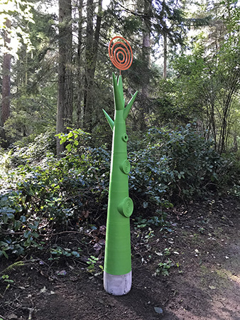 Sculptor Andrew Woodard sculptor Life Tree at Price Sculpture Forest park garden Coupeville Whidbey Island