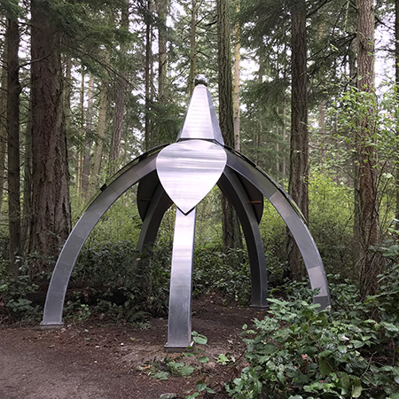 Sculptor Gary Gunderson sculpture Pentillium at Price Sculpture Forest park garden Coupeville Whidbey Island
