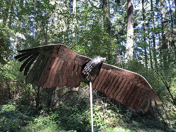 Sculptor Greg Neal sculpture Soaring Eagle at Price Sculpture Forest sculpture park garden