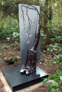 Sculptor painter Jennifer Kapnek All Things Equal at Price Sculpture Forest park garden Coupeville Whidbey Island