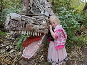 Eva with Joe Treat Tyrannosaurus Rex - photo by Dondi Budde of Oak Harbor