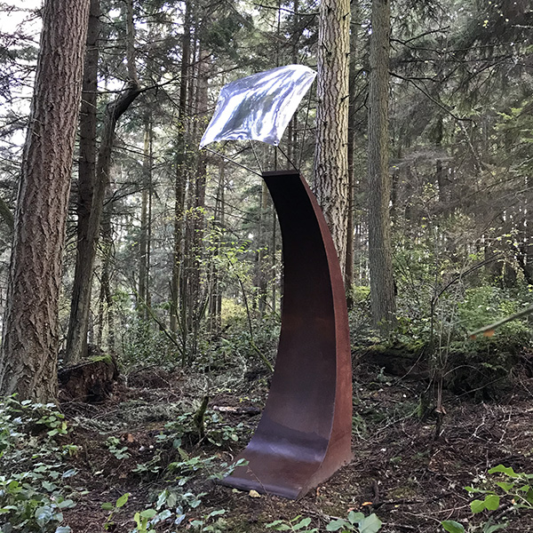 Bill Wentworth Cosmic Sail at Price Sculpture Forest park garden in Coupeville on Whidbey Island