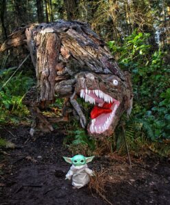 Joe Treat Tyrannosaurus Rex with Baby Yoda Grogu at Price Sculpture Forest - photo by Calex Haney from Oak Harbor WA Instagram concordiaphotos