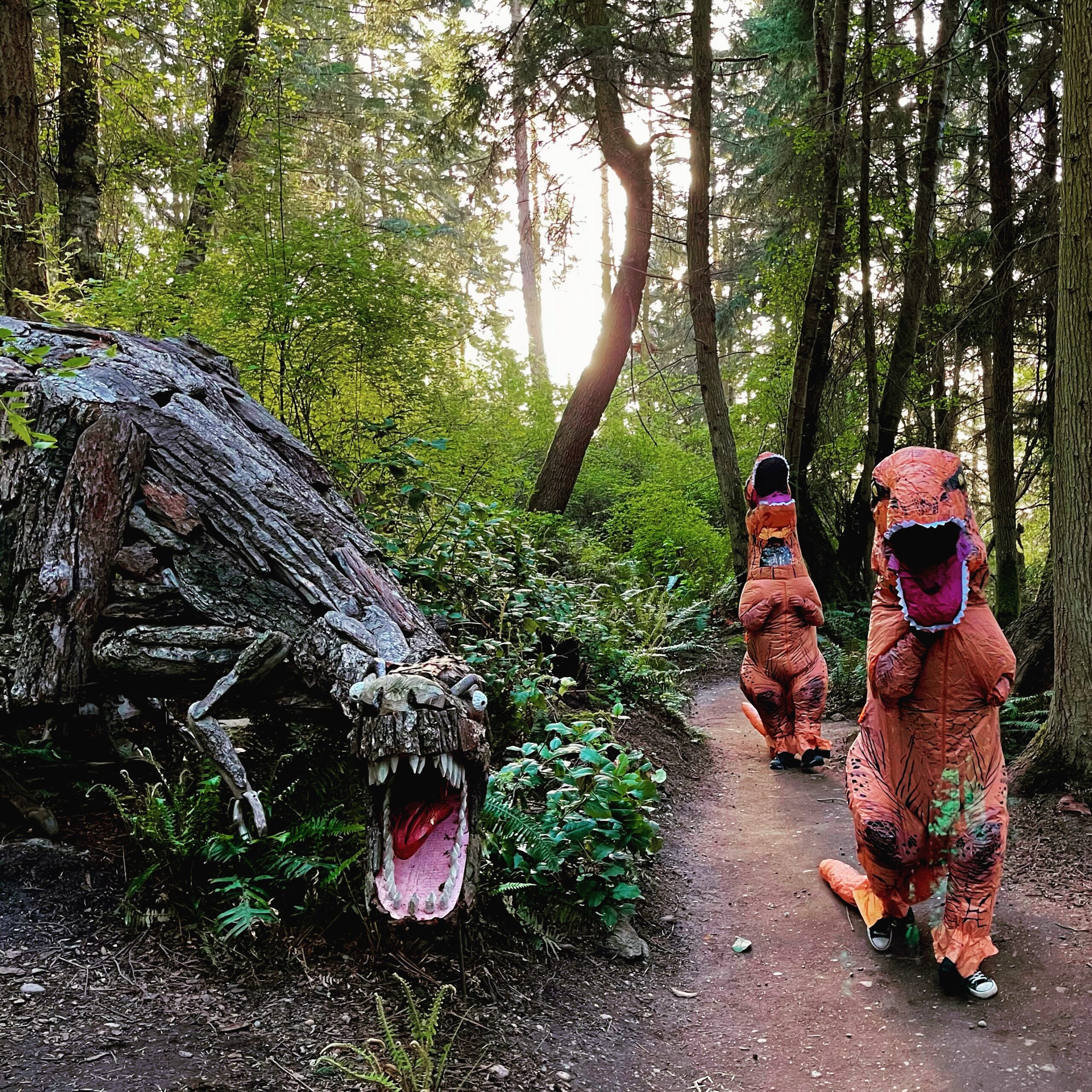 Tyrannosaurus Rex dinosaurs party with T Rex by Joe Treat at Price Sculpture Forest - photo and dinosaurs by Jackie Albor of Issaquah WA