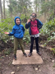 You Too Can Be A Sculpture by grandchildren Jake and Molly at Price Sculpture Forest - photo by Betty Keeton of Oak Harbor
