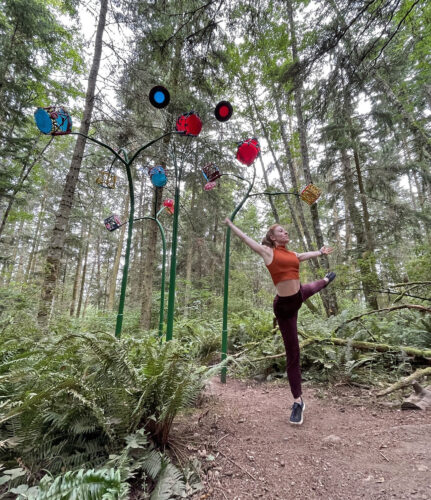 Emily Schoen Branch dancing at Playa Flowers by Jeff Tangen at Price Sculpture For