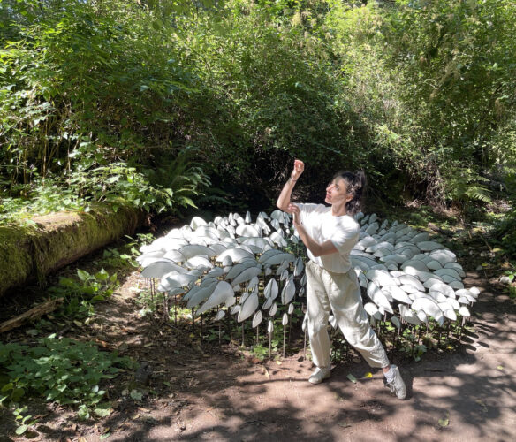 Hannah Simmons dancing at Lichen Series: Spore Patterns by Jenni Ward at Price Sculpture Forest