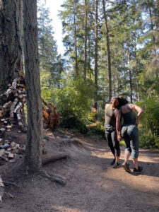 Ivana Lin and Mary Sigward dancing at Nature's Keystone by Anthony Heinz May at Price Sculpture Forest