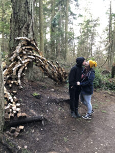 Natures Keystone by Anthony Heinz May with Sara Jean and Talon Coquillette at Price Sculpture Forest - photo by Jordan Jones