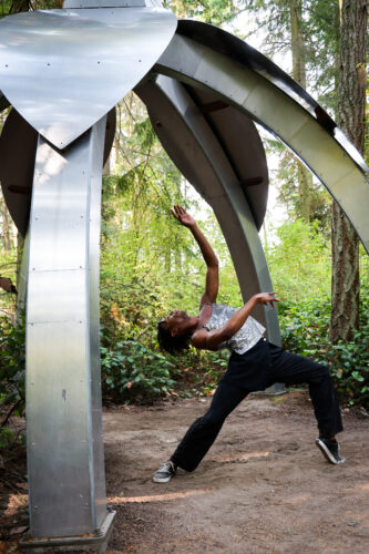 Dancer Zsilas Michael Hughes at Price Sculpture Forest Wander Wonder 2023 - photo by Terrel Lefferts