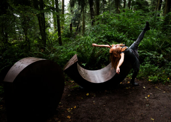 Dancer Audrey Rachelle at Inside Out 14 and 15 by MacRae Wylde at Wander Wonder 2024 at Price Sculpture Forest - photo by Terrel Lefferts