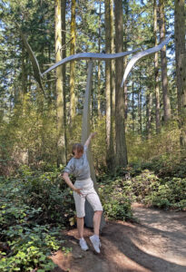 Kaelyn Lefferts at Wind Shear by Jeff Kahn in Price Sculpture Forest