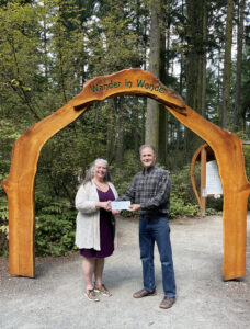 Whidbey Island Garden Tour grant presented by Patricia Griffin to Price Sculpture Forest